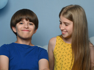 beautiful children on blue background