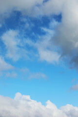 Blue sky with white fluffy clouds