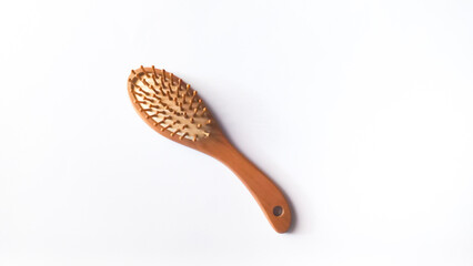 wooden comb on white background
