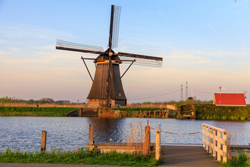 Naklejka premium Europe, The Netherlands, Holland. South Holland, Zuid Holland, Kinderdijk. Windmills.