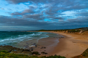 Sunrise seascape with strong southerly winds