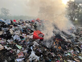 Landfill with Smoke from Burn
