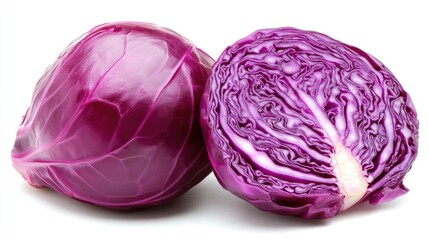 A close-up of sliced red cabbage with detailed texture, placed on a white background.