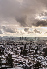 Winter Cityscape During Overcast Weather With Snow-Covered Buildings and Streets