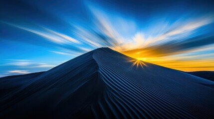 A stunning landscape featuring a sand dune under a vibrant sky at sunset, with dynamic clouds and warm colors illuminating the scene.
