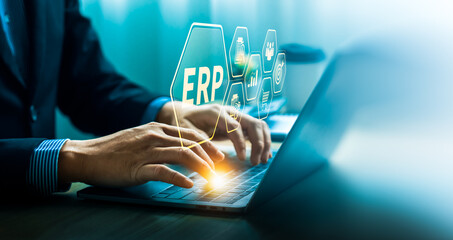 Businessman Using ERP Software on Laptop, Highlighting Enterprise Resource Planning Tools, Data Management, Workflow Optimization, and Business Integration for Corporate Efficiency