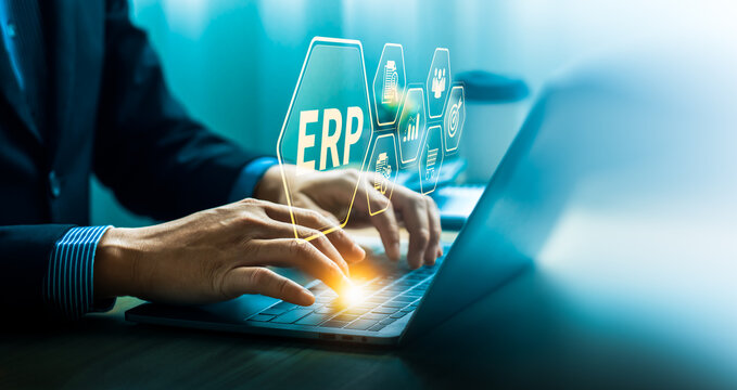Businessman Using ERP Software on Laptop, Highlighting Enterprise Resource Planning Tools, Data Management, Workflow Optimization, and Business Integration for Corporate Efficiency