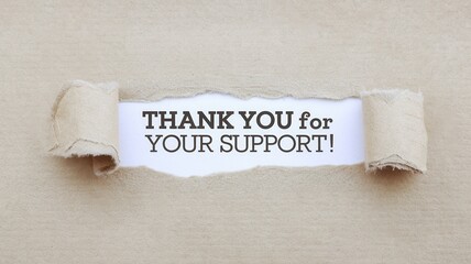 Text thank you for your support peeking through torn paper