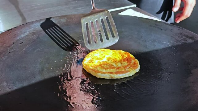Frying Roti, Traditional Indian Food.