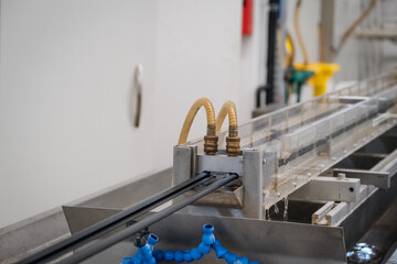 Automated Material Processing: A setup for continuous manufacturing with a fluid cooling system