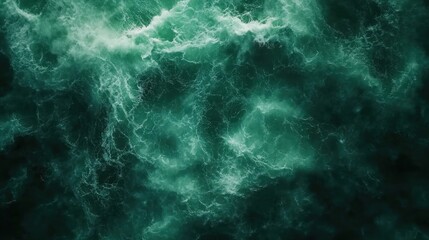 Aerial wave background. Drone shot directly from above, green turquoise color, huge waves. Empty space