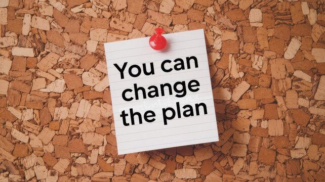 A note saying you can change the plan on corkboard