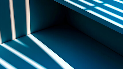 Geometric Shadows: Abstract composition of vibrant blue surfaces with stark shadows from a window. The interplay of light and form creating depth and dimension.