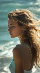 Naklejka premium Young Woman Strolling by the Water with Windswept Hair