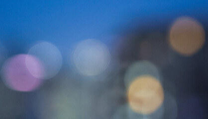 Blue bokeh. Blurred light on blue background.