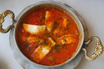 Delicious Traditional Curry with Paneer in a Silver Bowl