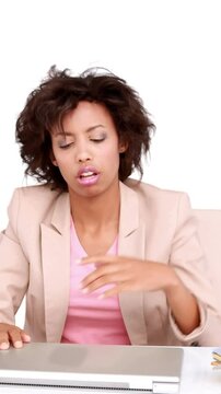 Businesswoman feeling stressed at her desk