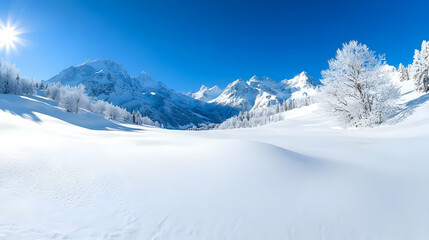 Fototapeta premium Snow-covered alpine valley surrounded by majestic mountains under a clear blue sky on a sunny winter day.