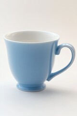 Obraz premium Light blue teacup, studio shot, white background, beverage advertising