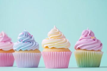 Colorful Frosted Cupcakes on Blue Background for Dessert Lovers
