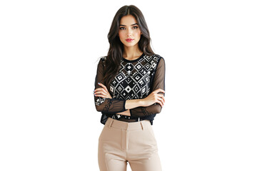 Fototapeta premium Confident woman with long dark hair wearing a black patterned blouse and beige pants, posing with arms crossed on a white background. Ai generative