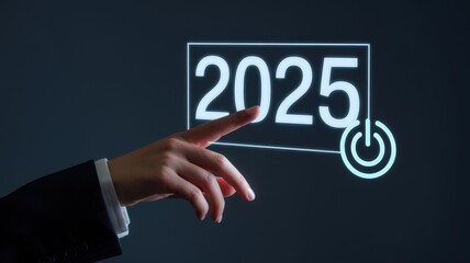 Hand touches the year twenty twenty five on a screen