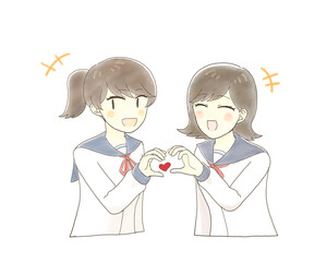 笑顔でハートポーズをする女子学生たち