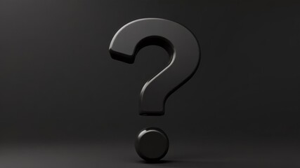 black question mark close up on dark background