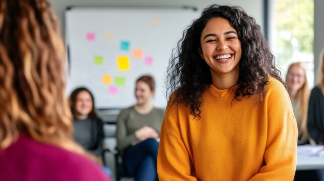 A diverse group of colleagues enjoys an informal brainstorming session filled with laughter and creativity in a well-lit office space, with vibrant notes on a whiteboard
