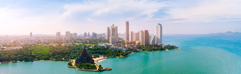 Fototapeta premium Aerial view panorama Pattaya with Sanctuary of Truth wooden temple on beach of Chonburi, Thailand