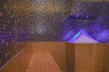 Ice snow room in ambient light inside spa wellness thermal suite onboard modern cruiseship cruise...