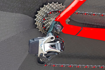 Closeup View of Rear Derailier and Rear Cassette with Dirty Chain and Cassette Sprockets Against...