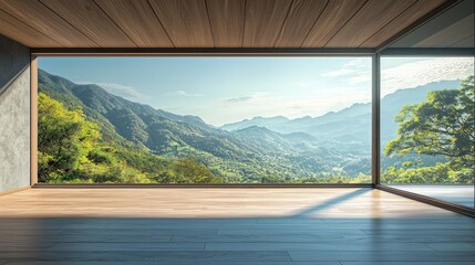 A large, open concrete space with tall glass windows overlooking trees and grass. Sunlight shines through the windows