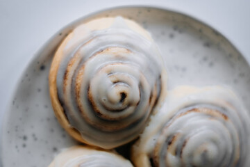 Some cinnabons on a bright background