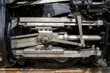 Detail shot of steam locomotive wheel and driver