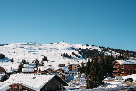 Landscape with a ski slopes and village