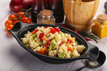 Vegan cuisine couscous with vegetables