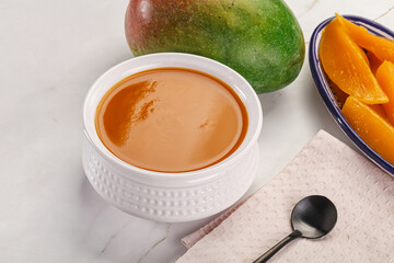 Sweet mango puree in the bowl
