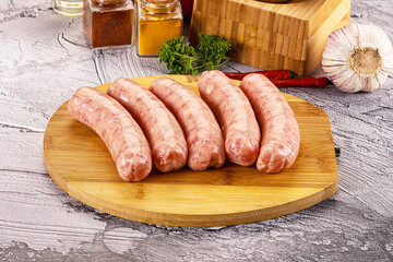 Raw meat sausages for grill