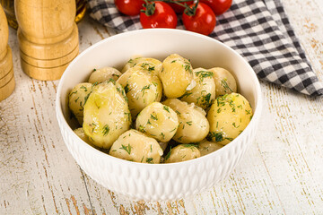 Young boiled mini potato with dill