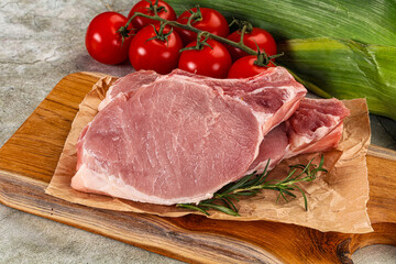 Raw pork steak loin with bone