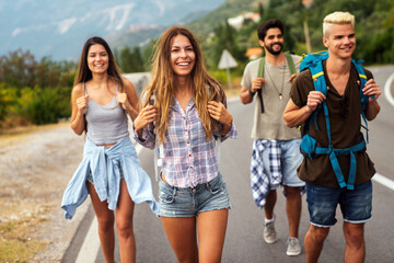 Multiracial best friends having fun outside. Happy friends on road trip have fun at summer vacation