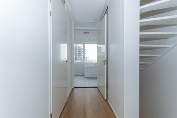 interior unfurnished empty basic stairway corridor landing to bathroom in modern new build...