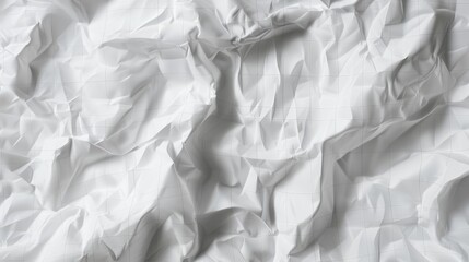 Obraz premium a piece of white paper crumpled with delicate grid patterns, depicted in fine detail. The texture should be lifelike