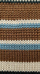 Colorful knitted texture with horizontal stripes in earthy tones and blue accents