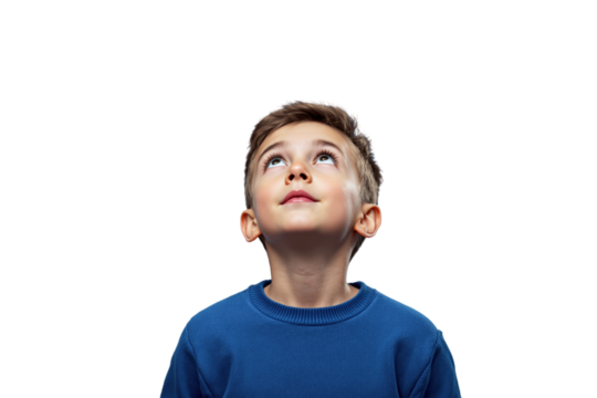 Young boy wearing a blue sweater looking up with a curious expression, isolated on a white background. Concept of curiosity and imagination. Ai generative