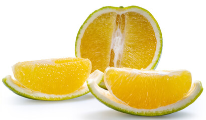 Citrus sinensis or sweet orange on white background,Oranges with green peel and sweet yellow inside isolate on white background with clipping path.