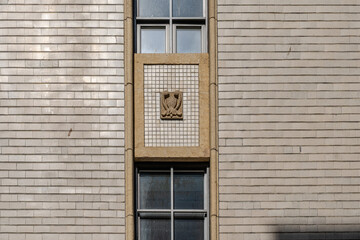 A collection of various exterior windows on buildings, showcasing diverse architectural styles and...