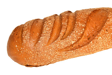 Whole grain wheat bread. Side view. Lies on a white background.