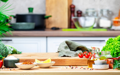 Healthy eating, cooking, food background. Oak cutting board with vegetables, herbs, mushrooms and...